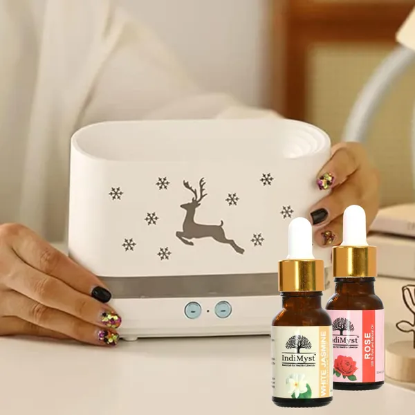 Rose_Jasmine_Deer_Design_Diffuser_Set_Aroma_Oil_Combo_Pack_Of_2_Essential_Oils_(15_Ml_Each)_&_Deer_Design_Flame_Diffuser/Humidifier_-_100%_Pure_Aromatherapy_Oils_(Rose_&_Jasmine)_(2_X_15_Ml)