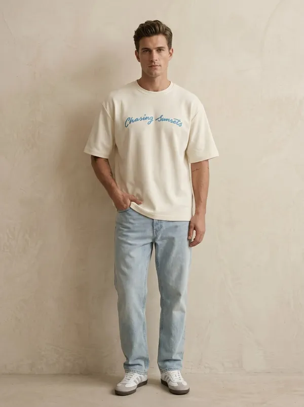 Chasing_Sunsets_Oversized_Tee_–_Off_White_|_Unisex_