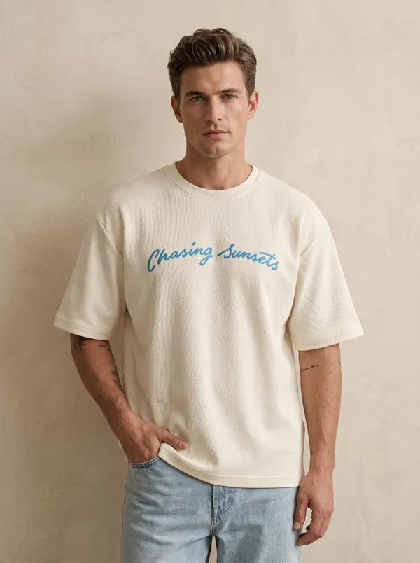 Chasing_Sunsets_Oversized_Tee_–_Off_White_|_Unisex_