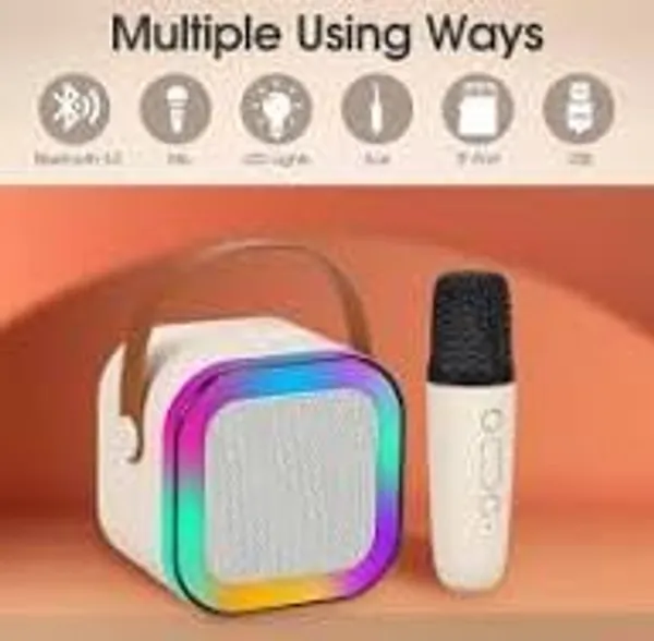 Pink_Plastic_Wireless_Mic_Bluetooth_Speaker_For_Unisex