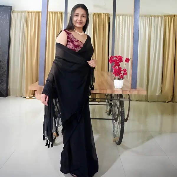 Black_Georgette_Custom_Tassel-Stitched_Saree_With_A_Tail_Ajrakh_Print_Padded_Blouse_For_Women
