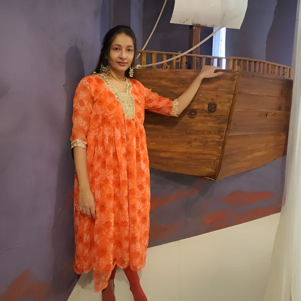 Orange_Muslin_Heavy_Lace_Stitched_Umbrella_Kurta_For_Women