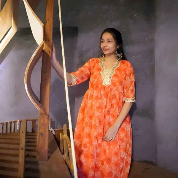 Orange_Muslin_Heavy_Lace_Stitched_Umbrella_Kurta_For_Women