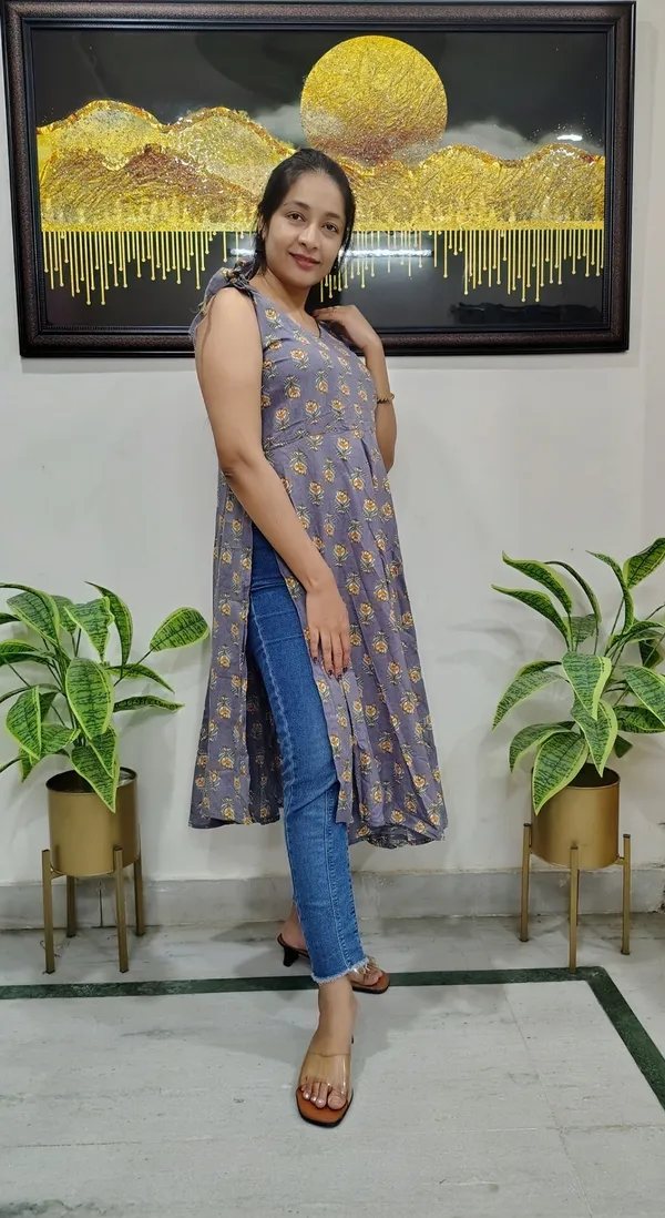 Cyan_Light_Floral-Print_Cotton_Sleeveless_Kurta_With_One-Side_Bow_Sleeve_And_Umbrella_Flare_For_Women