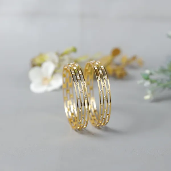 Elegant_3-Layer_Gold-Plated_Bangles_with_Shimmering_Stone_Studs_-_Set_of_2