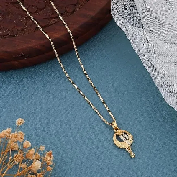 Gold_Plated_Necklace_With_Unique_Pendant_Design_Featuring_Decorative_Stones_Plated_Metal_Chain