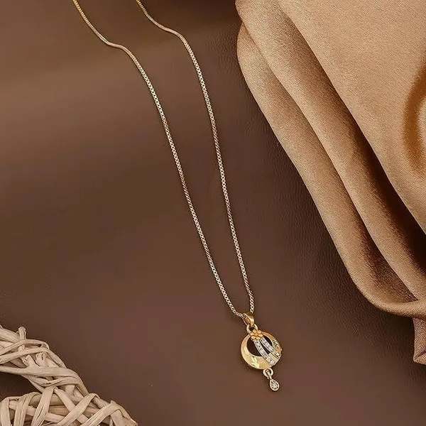Gold_Plated_Necklace_With_Unique_Pendant_Design_Featuring_Decorative_Stones_Plated_Metal_Chain