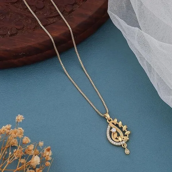 Gold_Plated_Pendant_Necklace_With_Intricate_Design_And_Gemstone_Accents_Pearl_Metal_Pendant