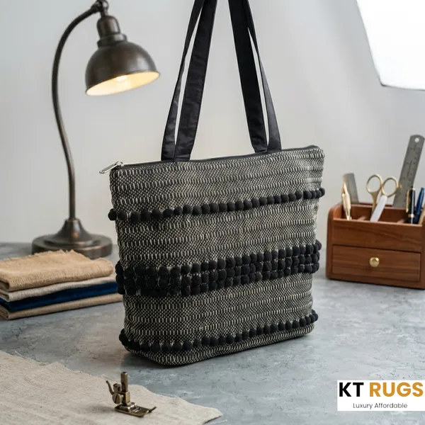 Hand-Woven_Artisan_Tote_Bag_With_Pom-Pom_Accents