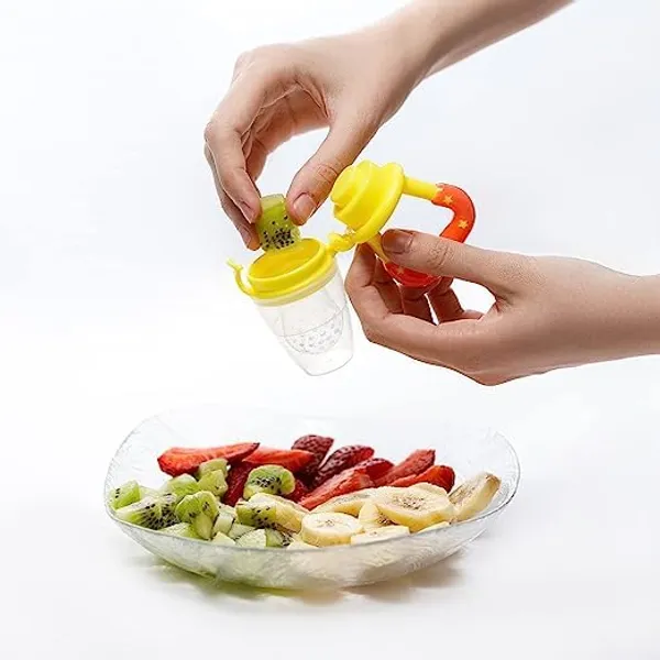 Multi_Combo_Of_Feeding_Bottle_With_Spoon_&_Fruit_Feeder_Pacifier_|_Food_Feeder_With_Rattle_&_Spoon_|_Spoon_Squeeze_Feeder_|_Silicone_Baby_Feeding_Spoon_|_Yellow_Color