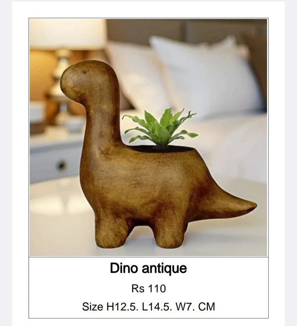 Brown_Ceramic_Antique_Dinosaur_Shape_Planter_With_Succulent