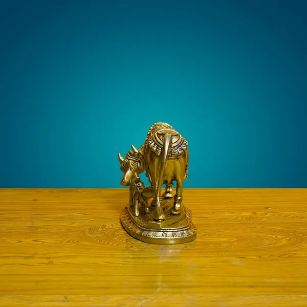 Antique_Brass_Kamdhenu_Cow_With_Calf_Carving_Om_And_Swastik_On_Cow,_Showpiece_For_Home_Decor