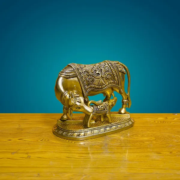 Antique_Brass_Kamdhenu_Cow_With_Calf_Carving_Om_And_Swastik_On_Cow,_Showpiece_For_Home_Decor