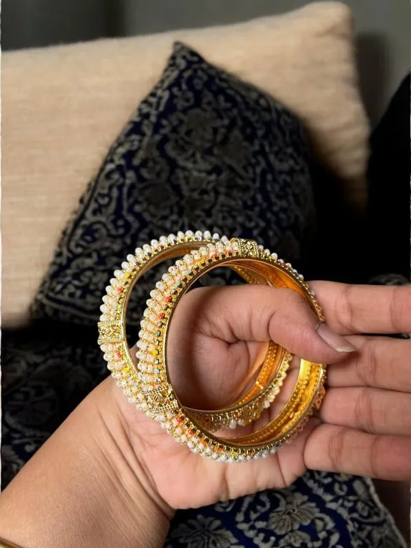 Golden_Traditional_Pearl_Studded_Gold_Plated_Bangles_For_Women_-_Set_Of_2