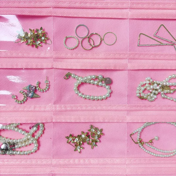 Hanging_Jewelry_Organizer_48_Double-Sided_Pockets_for_Earrings,_Necklaces,_Rings_&_Accessories_|_Space-Saving_Closet_Jewelry_Storage_(Pink)