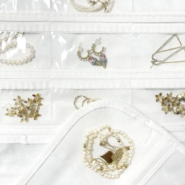 Hanging_Jewelry_Organizer_48_Double-Sided_Pockets_for_Earrings,_Necklaces,_Rings_&_Accessories_|_Space-Saving_Closet_Jewelry_Storage_(White)