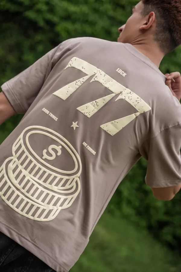 Sandstone_Dust_Lucky_Seven_Printed_Cotton_Oversized_Tee_For_Unisex