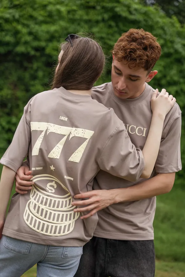 Sandstone_Dust_Lucky_Seven_Printed_Cotton_Oversized_Tee_For_Unisex