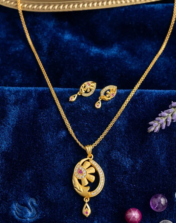 Elegant_Floral_Pendant_&_Earrings_Set_–_Gold-Plated_with_Ruby-Pink_Stones_and_American_Diamond_Accents