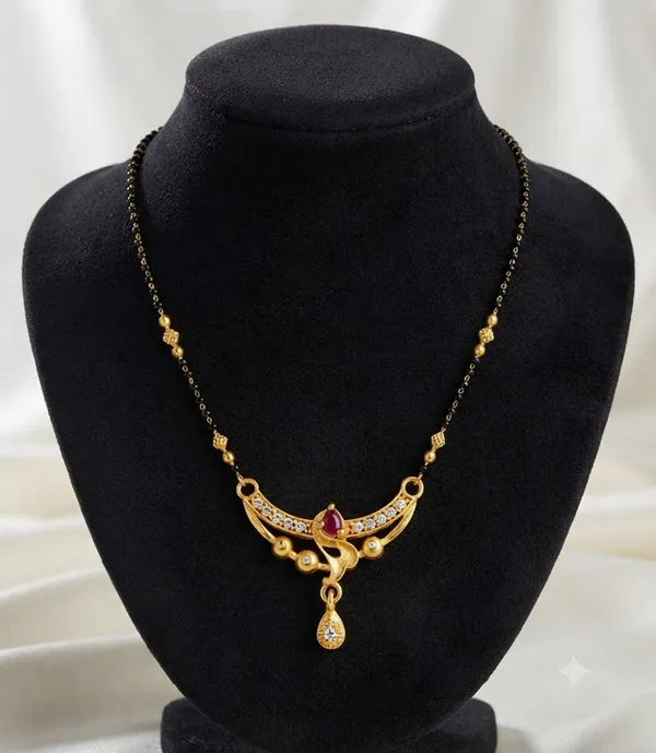 Elegant_Gold-Plated_Black_Beaded_Mangalsutra_with_Ruby_and_White_Stone_Pendant
