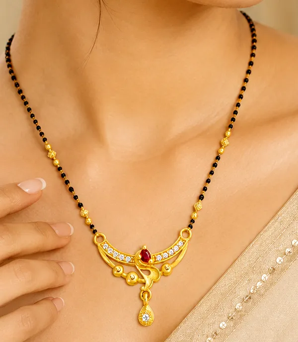 Elegant_Gold-Plated_Black_Beaded_Mangalsutra_with_Ruby_and_White_Stone_Pendant