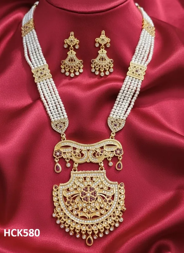 Exquisite_Multi-Strand_Pearl_Rani_Haar_Necklace_Set_with_Filigree_Pendant_&_Matching_Earrings