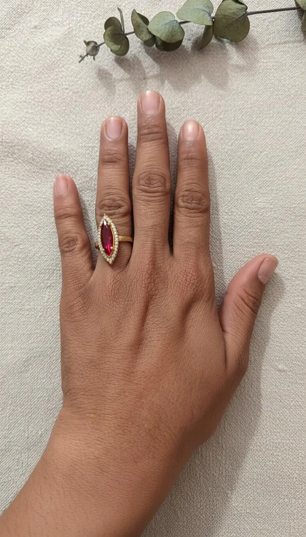 Regal_Marquise_Ruby_&_Diamond_Halo_Ring_in_18K_Yellow_Gold