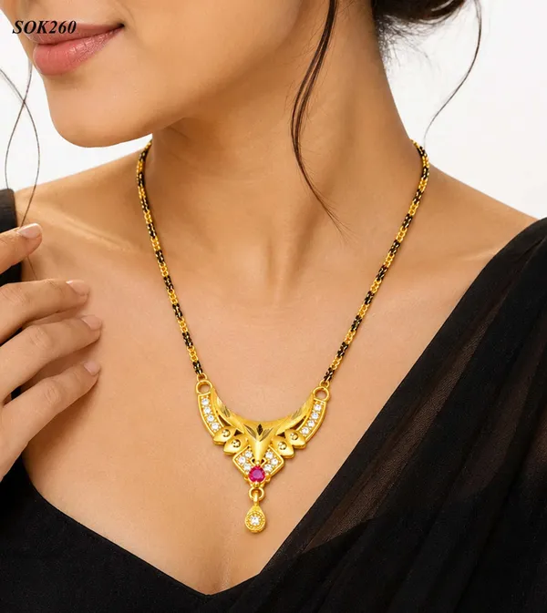 Traditional_Gold_and_Black_Beaded_Mangalsutra_with_Ruby_and_CZ_Pendant