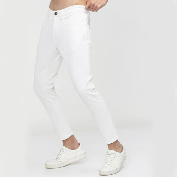 White_Cotton_Blend_Slim_Mid_Rise_Jeans_For_Men
