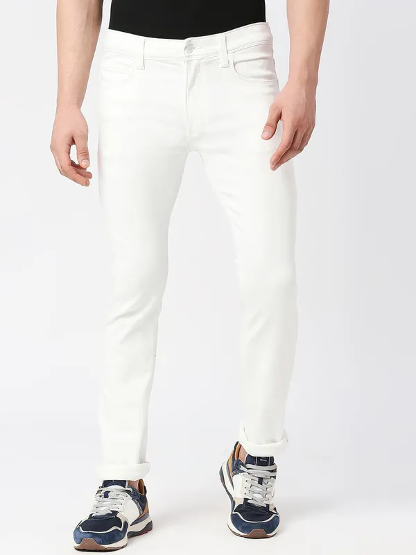 White_Cotton_Blend_Slim_Mid_Rise_Jeans_For_Men