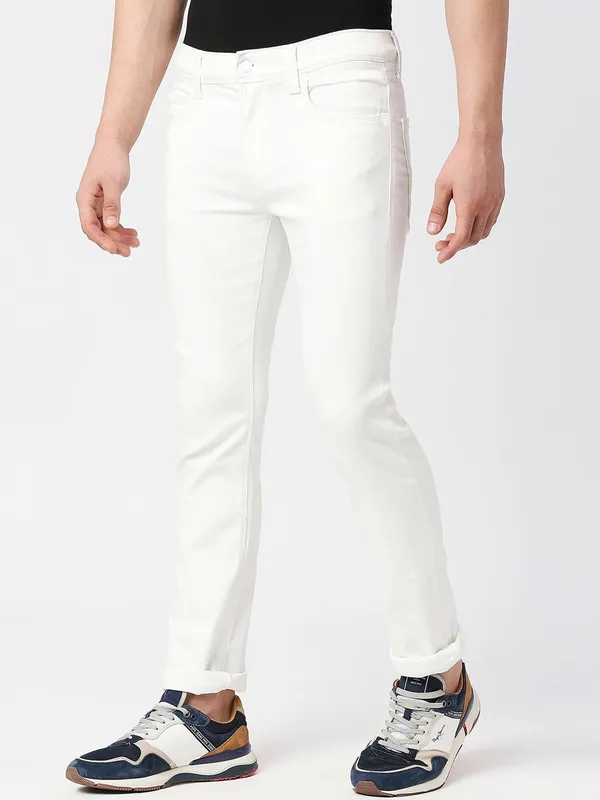 White_Cotton_Blend_Slim_Mid_Rise_Jeans_For_Men