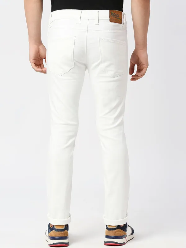 White_Cotton_Blend_Slim_Mid_Rise_Jeans_For_Men