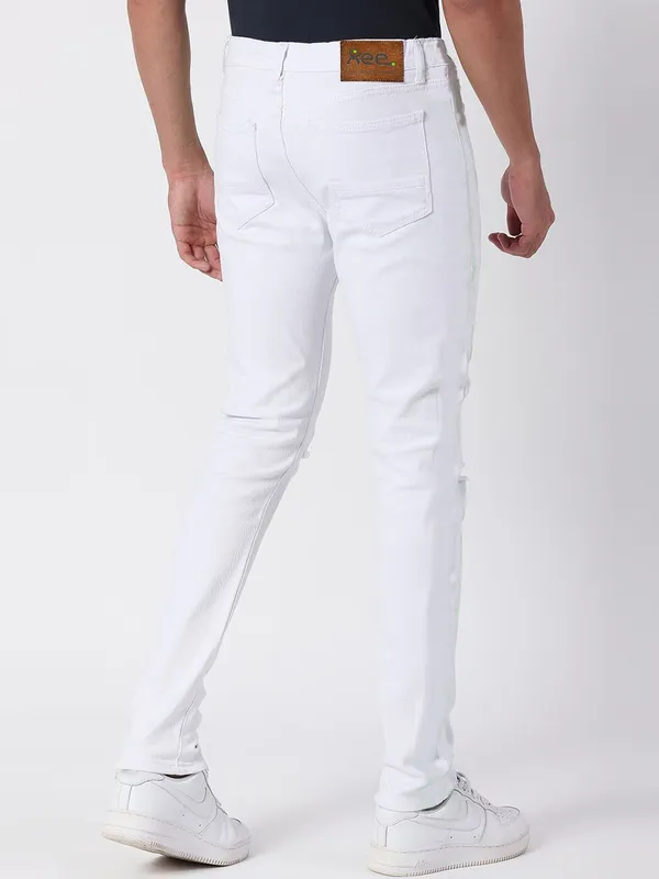 White_Cotton_Blend_Slim_Mid_Rise_Jeans_For_Men