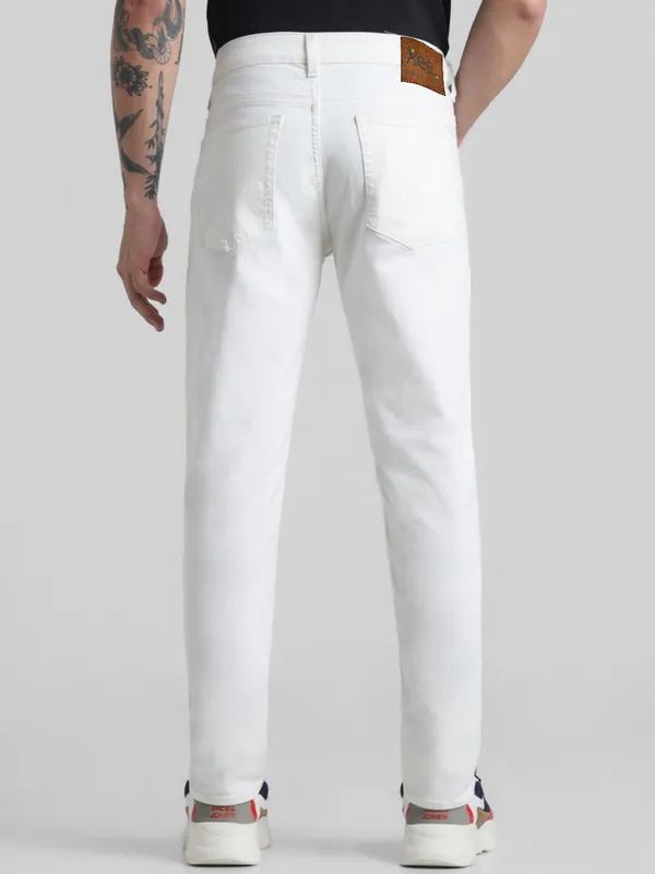 White_Mid_Rise_Cotton_Blend_Slim_Jeans_For_Men