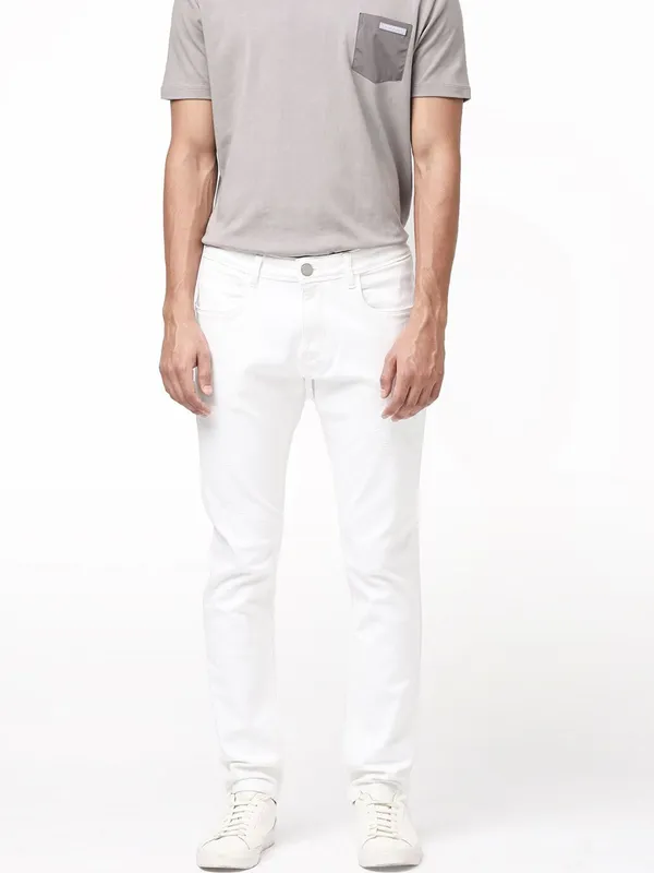 White_Cotton_Blend_Slim_Mid_Rise_Jeans_For_Men