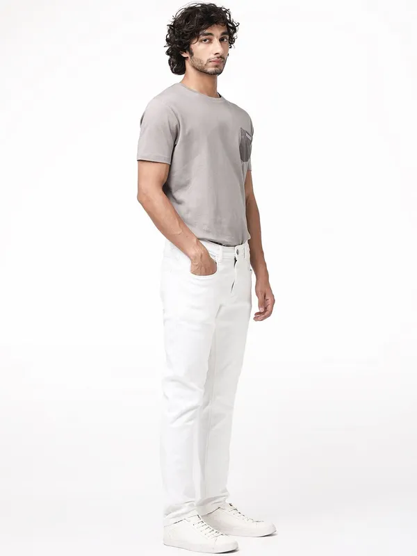 White_Cotton_Blend_Slim_Mid_Rise_Jeans_For_Men