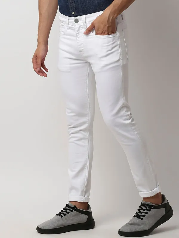 White_Cotton_Blend_Slim_Mid_Rise_Jeans_For_Men