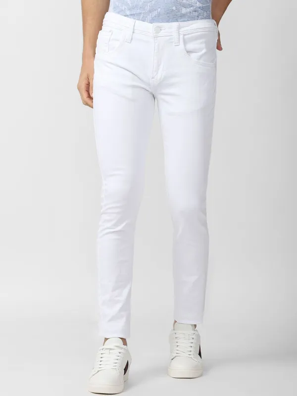 White_Cotton_Blend_Slim_Mid_Rise_Jeans_For_Men