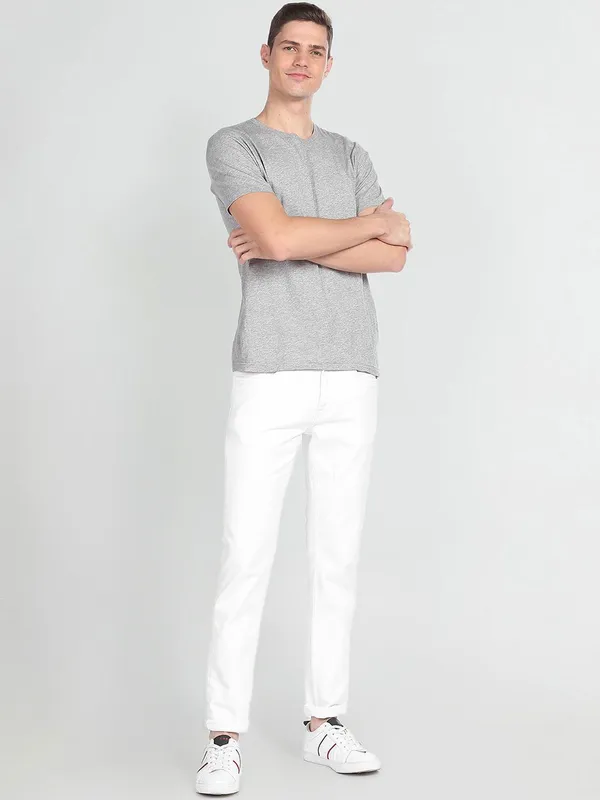 White_Cotton_Blend_Slim_Mid_Rise_Jeans_For_Men