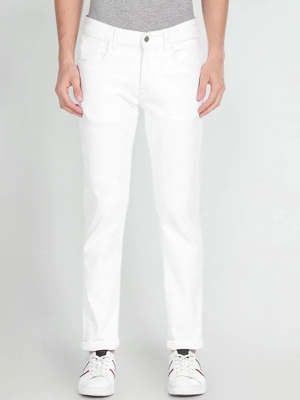 White_Cotton_Blend_Slim_Mid_Rise_Jeans_For_Men
