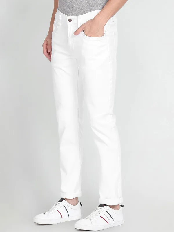White_Cotton_Blend_Slim_Mid_Rise_Jeans_For_Men
