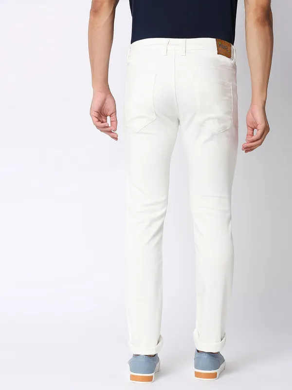 White_Cotton_Blend_Slim_Mid_Rise_Jeans_For_Men