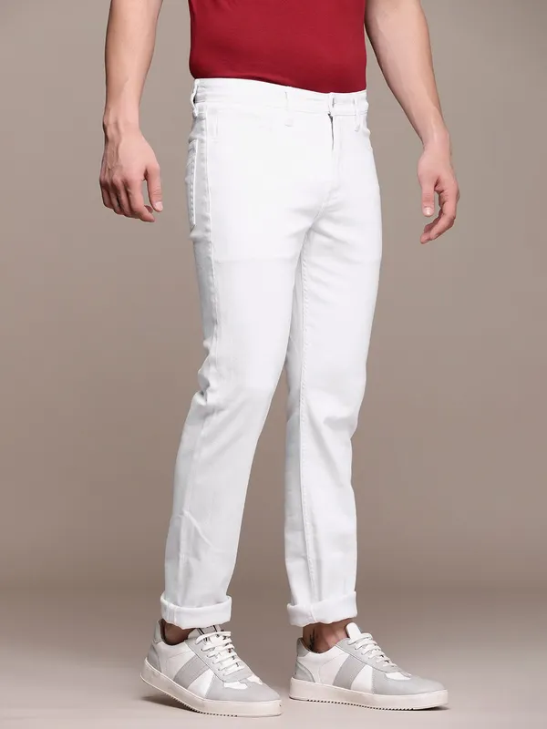 White_Cotton_Blend_Slim_Mid_Rise_Jeans_For_Men