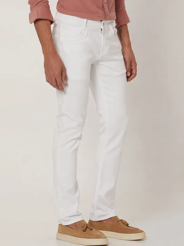 White_Cotton_Blend_Slim_Mid_Rise_Jeans_For_Men