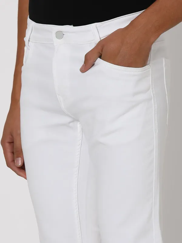 White_Cotton_Blend_Slim_Mid_Rise_Jeans_For_Men