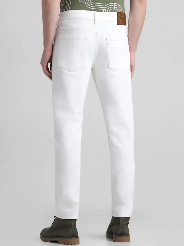 White_Cotton_Blend_Slim_Mid_Rise_Jeans_For_Men