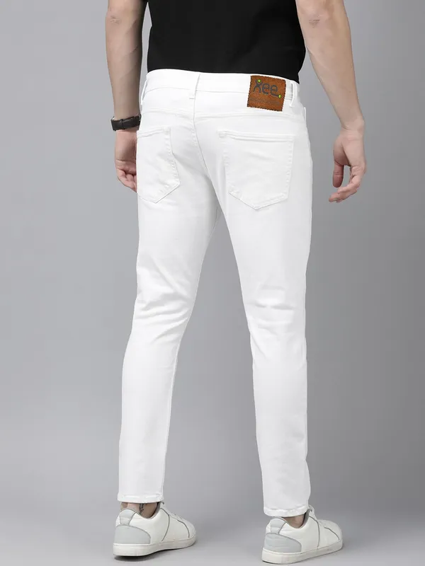 White_Cotton_Blend_Slim_Mid_Rise_Jeans_For_Men