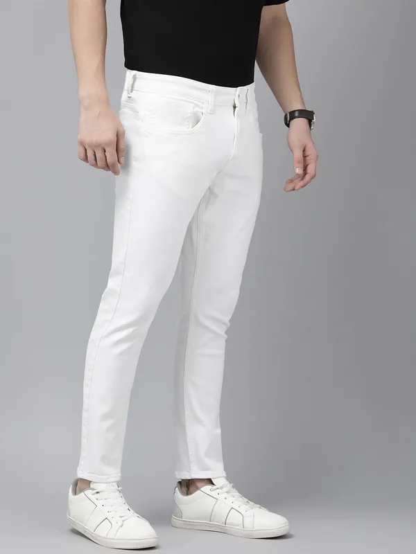 White_Cotton_Blend_Slim_Mid_Rise_Jeans_For_Men