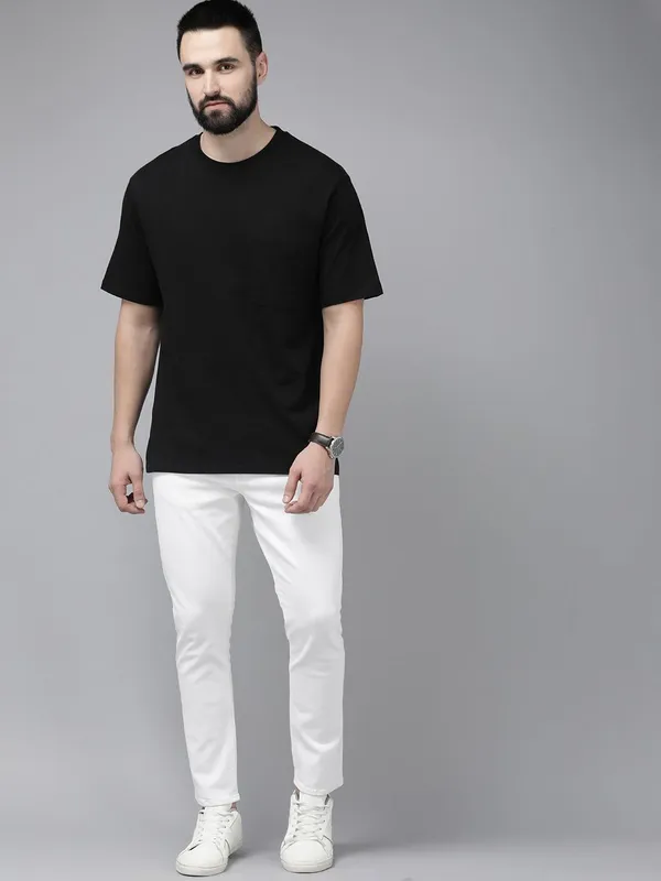 White_Cotton_Blend_Slim_Mid_Rise_Jeans_For_Men