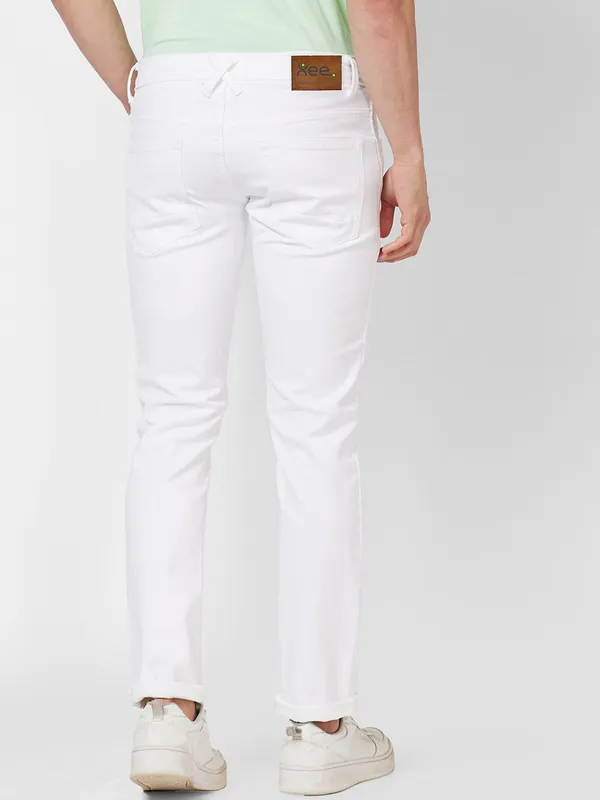 White_Mid_Rise_Cotton_Blend_Slim_Jeans_For_Men